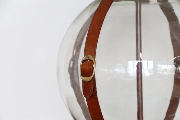 Eaton Glass Ball Lamp with Tan Leather Straps and Brass Buckles